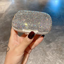 Travel-focused image: pill box nestled in open backpack with passport and keys