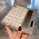 Close-up of crystal accents on calculator housing