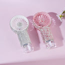 Top-down view highlighting USB-C port and control buttons on handheld fan