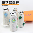 Tumbler held in hand showing compact size and ergonomic grip