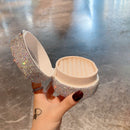 Top-down shot showing organized interior layout with earring slots and ring grooves