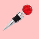 Luxury diamond-accented vacuum wine stopper set on marble surface