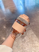 Tumbler with condensation droplets, styled on linen napkin