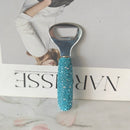 Champagne Gold opener reflecting ambient light on marble countertop