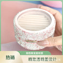 Front view of pink Mini Macaron jewelry box with open lid revealing velvet interior