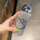White KT cat tumbler featuring playful feline graphic and sparkling crystal trim