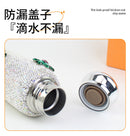 Tumbler on kitchen counter beside fruit and herbs — fresh living context