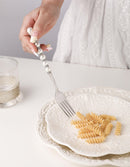 Pearl detail under macro lens highlighting precision stainless steel milling