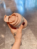 Tumbler placed beside ceramic mug and reusable tote bag