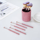 Close-up of nylon bristle texture on foundation brush with wooden handle