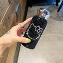 Black KT cat tumbler on dark marble surface showcasing contrast and shine