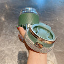 Tumbler beside steaming mug — contrasting cold vs warm beverage styling