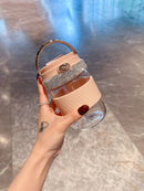 Front view of pink glass tumbler with stainless steel lid and silicone straw on white background